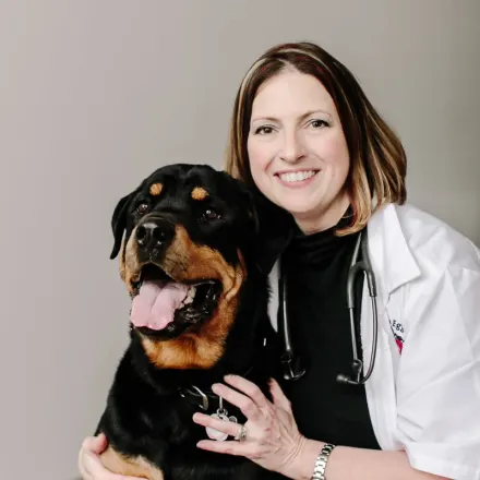 Dr. Jennifer LoVullo with large rottweiler